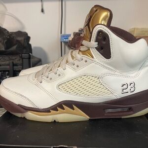 Jordan White and Gold Athletic Shoes with Classic Design